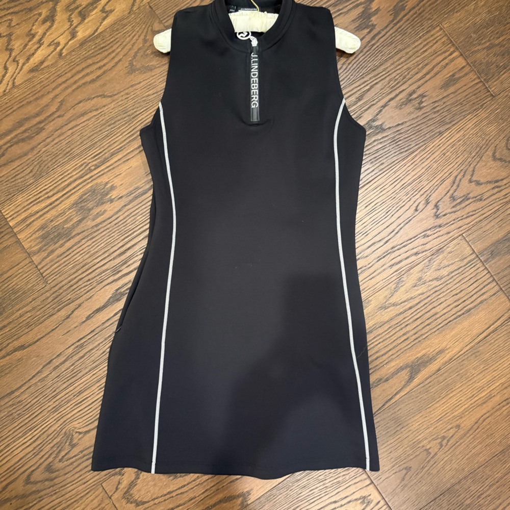 J.Lindeberg Black golf dress with contrast, white trim, and zipper Detail
